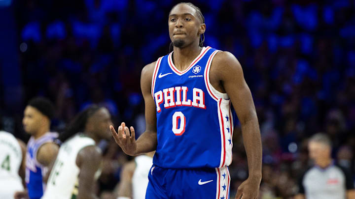 Oct 23, 2024; Philadelphia, Pennsylvania, USA; Philadelphia 76ers guard Tyrese Maxey (0) reacts to his three pointer against the Milwaukee Bucks during the first quarter at Wells Fargo Center. Mandatory Credit: Bill Streicher-Imagn Images Oct 23, 2024; Philadelphia, Pennsylvania, USA; Philadelphia 76ers guard Tyrese Maxey (0) reacts to his three pointer against the Milwaukee Bucks during the first quarter at Wells Fargo Center. Mandatory Credit: Bill Streicher-Imagn Images