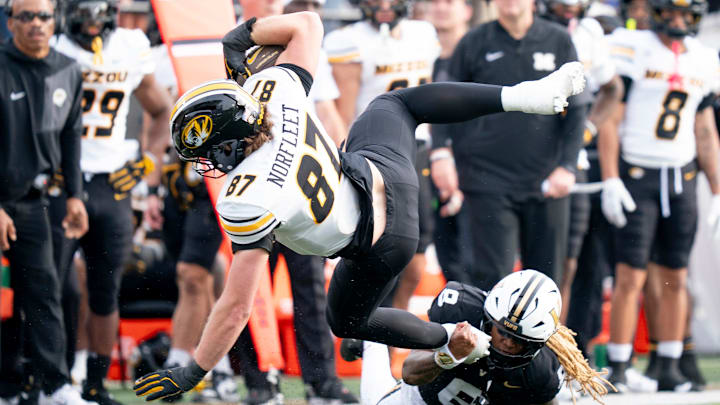 Vanderbilt's safety CJ Heard (8) tackles Missouri's tight end Brett Norfleet (87) during their game at FirstBank Stadium in Nashville, Tenn., Saturday, Oct. 25, 2025. Vanderbilt's safety CJ Heard (8) tackles Missouri's tight end Brett Norfleet (87) during their game at FirstBank Stadium in Nashville, Tenn., Saturday, Oct. 25, 2025.