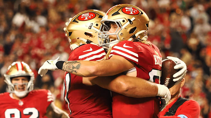 Oct 27, 2024; Santa Clara, California, USA; San Francisco 49ers tight end George Kittle (85) celebrates after scoring a touchdown against the Dallas Cowboys during the third quarter at Levi's Stadium. Mandatory Credit: Kelley L Cox-Imagn Images
