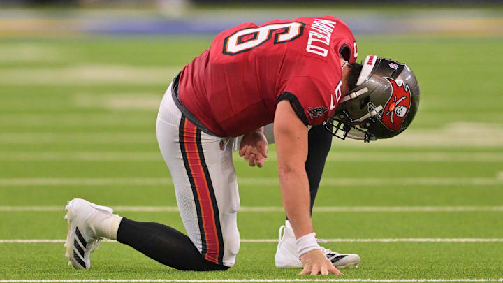 Nov 23, 2025; Inglewood, California, USA; Tampa Bay Buccaneers quarterback Baker Mayfield (6) kneels on the field with an apparent injury against the Los Angeles Rams during the second quarter at SoFi Stadium. Mandatory Credit: Jayne Kamin-Oncea-Imagn Images Nov 23, 2025; Inglewood, California, USA; Tampa Bay Buccaneers quarterback Baker Mayfield (6) kneels on the field with an apparent injury against the Los Angeles Rams during the second quarter at SoFi Stadium. Mandatory Credit: Jayne Kamin-Oncea-Imagn Images