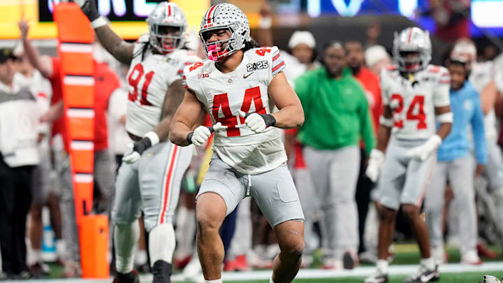 Ohio State Buckeyes defensive end JT Tuimoloau (44) celebrates a tackle against Notre Dame Fighting Irish in the second quarter during the College Football Playoff championship at Mercedes-Benz Stadium in Atlanta on January 20, 2025.