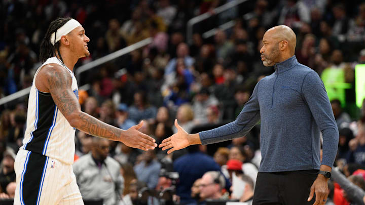 Mar 21, 2025; Washington, District of Columbia, USA; Orlando Magic forward Paolo Banchero (5) and head coach Jamahl Mosley react during the second quarter against the Washington Wizards at Capital One Arena. Mandatory Credit: Reggie Hildred-Imagn Images