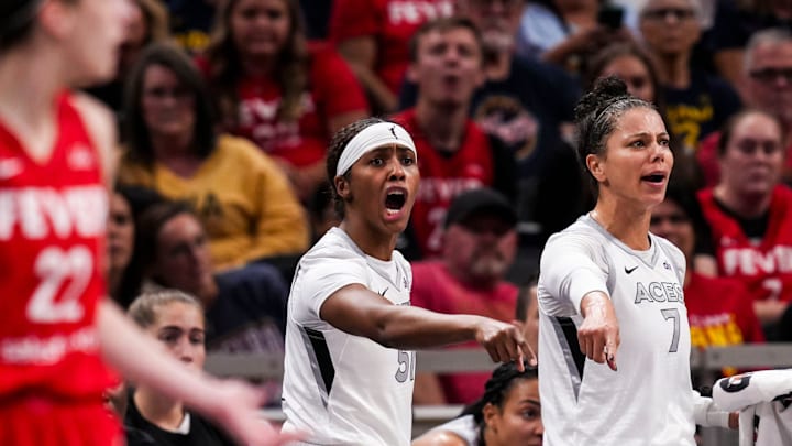 Las Vegas Aces guard Sydney Colson (51) and Las Vegas Aces forward Alysha Clark (7) reacts to a call Friday, Sept. 13, 2024, during a game between the Indiana Fever and the Las Vegas Aces on Friday, Sept. 13, 2024, at Gainbridge Fieldhouse in Indianapolis.