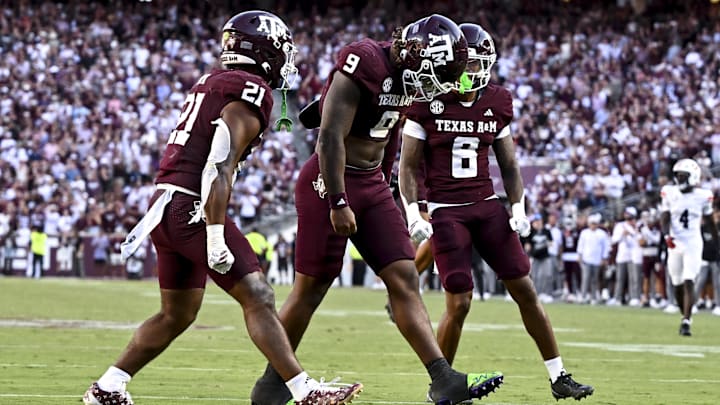 Texas A&M Aggies defensive end Cashius Howell (9) reacts after sacking Auburn Tigers quarterback Jackson Arnold during the fourth quarter at Kyle Field. Mandatory Credit: Maria Lysaker-Imagn Images 