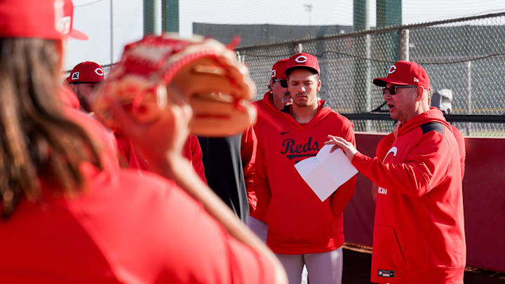 Cincinnati Reds manager Terry Francona speaks with pitchers before training, Wednesday, Feb. 19, 2025, at the Cincinnati Reds Player Development Complex in Goodyear, Ariz.