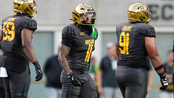 Aug 29, 2025; Waco, Texas, USA;  Baylor Bears linebacker Keaton Thomas (11) in action against the Auburn Tigers during the first half at McLane Stadium. Mandatory Credit: Chris Jones-Imagn Images