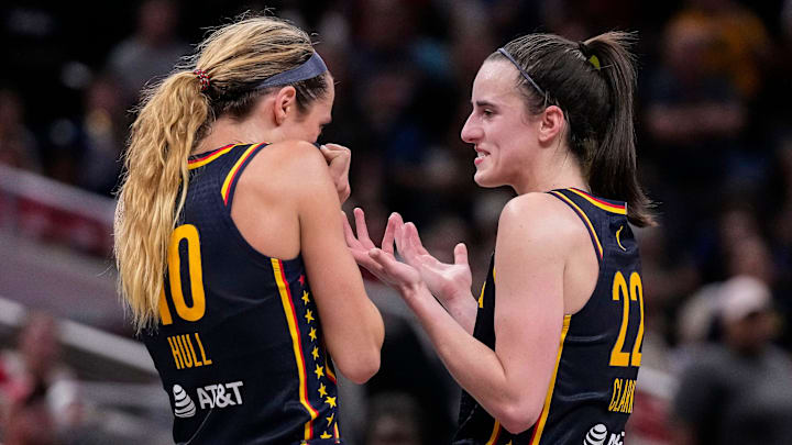 Indiana Fever guard Caitlin Clark (22) and Indiana Fever guard Lexie Hull (10) talk during a timeout on Sunday, Sept. 15, 2024, during the game at Gainbridge Fieldhouse in Indianapolis. The Indiana Fever defeated the Dallas Wings, 110-109. Indiana Fever guard Caitlin Clark (22) and Indiana Fever guard Lexie Hull (10) talk during a timeout on Sunday, Sept. 15, 2024, during the game at Gainbridge Fieldhouse in Indianapolis. The Indiana Fever defeated the Dallas Wings, 110-109.