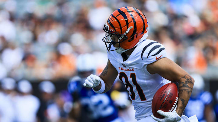 Aug 23, 2025; Cincinnati, Ohio, USA; Cincinnati Bengals wide receiver Jermaine Burton (81) runs with the ball against the Indianapolis Colts in the first half at Paycor Stadium. Mandatory Credit: Katie Stratman-Imagn Images