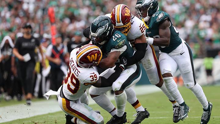 Sep 13, 2026; Philadelphia, Pennsylvania, USA; Philadelphia Eagles RB Saquon Barkley (26) runs the ball against Washington Commanders safety Jeremy Reaves (39) during the first half at Lincoln Financial Field. Mandatory Credit: Bill Streicher Sep 13, 2026; Philadelphia, Pennsylvania, USA; Philadelphia Eagles RB Saquon Barkley (26) runs the ball against Washington Commanders safety Jeremy Reaves (39) during the first half at Lincoln Financial Field. Mandatory Credit: Bill Streicher