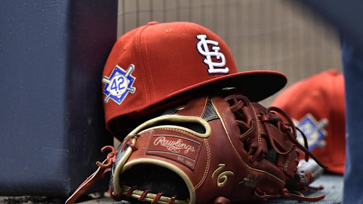Apr 15, 2019; Milwaukee, WI, USA; A cap rests on the dug out wall with the number 42 on the hat in honor of Major League Baseball s Jackie Robinson Day. Mandatory Credit: Michael McLoone-Imagn Images Apr 15, 2019; Milwaukee, WI, USA; A cap rests on the dug out wall with the number 42 on the hat in honor of Major League Baseball s Jackie Robinson Day. Mandatory Credit: Michael McLoone-Imagn Images