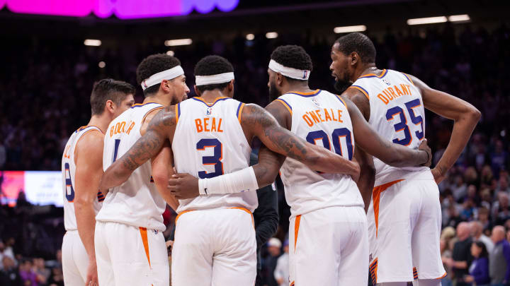 Apr 12, 2024; Sacramento, California, USA; Phoenix Suns guard Grayson Allen (8) and guard Devin Booker (1) and guard Bradley Beal (3) and forward Royce O'Neale (00) and forward Kevin Durant (35) huddle up before the final seconds of the fourth quarter at Golden 1 Center. Mandatory Credit: Ed Szczepanski-USA TODAY Sports Apr 12, 2024; Sacramento, California, USA; Phoenix Suns guard Grayson Allen (8) and guard Devin Booker (1) and guard Bradley Beal (3) and forward Royce O'Neale (00) and forward Kevin Durant (35) huddle up before the final seconds of the fourth quarter at Golden 1 Center. Mandatory Credit: Ed Szczepanski-USA TODAY Sports