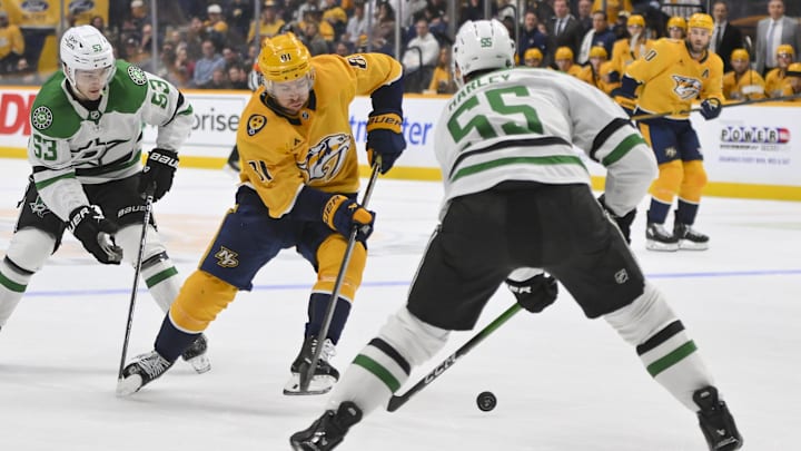 Oct 26, 2025; Nashville, Tennessee, USA;  Nashville Predators center Jonathan Marchessault (81) skates with the puck as Dallas Stars defenseman Thomas Harley (55) defends during the third period at Bridgestone Arena. Mandatory Credit: Steve Roberts-Imagn Images Oct 26, 2025; Nashville, Tennessee, USA;  Nashville Predators center Jonathan Marchessault (81) skates with the puck as Dallas Stars defenseman Thomas Harley (55) defends during the third period at Bridgestone Arena. Mandatory Credit: Steve Roberts-Imagn Images