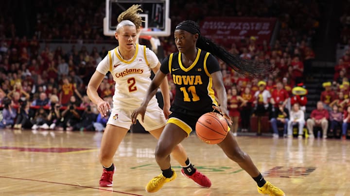 Dec 10, 2025; Ames, Iowa, USA; Iowa State Cyclones Arianna Jackson (2) defends Iowa Hawkeyes Chazadi 'chit-Chat' Wright (11) during the second half at James H. Hilton Coliseum. Mandatory Credit: Reese Strickland-Imagn Images Dec 10, 2025; Ames, Iowa, USA; Iowa State Cyclones Arianna Jackson (2) defends Iowa Hawkeyes Chazadi 'chit-Chat' Wright (11) during the second half at James H. Hilton Coliseum. Mandatory Credit: Reese Strickland-Imagn Images