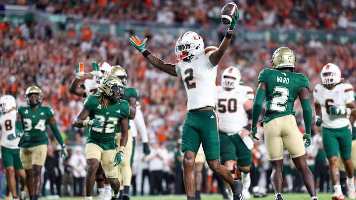 Sep 21, 2024; Tampa, Florida, USA; Miami Hurricanes wide receiver Isaiah Horton (2) scores a touchdown against the South Florida Bulls in the first quarter at Raymond James Stadium. Mandatory Credit: Nathan Ray Seebeck-Imagn Images