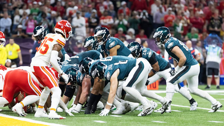 Feb 9, 2025; New Orleans, LA, USA; Philadelphia Eagles  quarterback Jalen Hurts (1) lines up for the tush push play on the goal line against the Kansas City Chiefs during Super Bowl LIX at Ceasars Superdome. Mandatory Credit: Mark J. Rebilas-Imagn Images