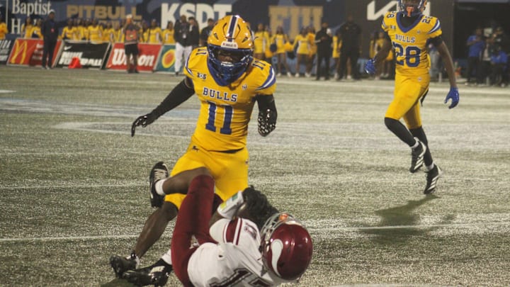 Raines wide receiver Kiran Jackson (17) makes the catch while falling backward against Miami Northwestern during the FHSAA Class 3A high school football final at Pitbull Stadium in Miami on Dec. 12, 2025. [Clayton Freeman/Florida Times-Union]