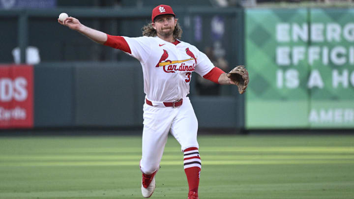 Jun 23, 2025; St. Louis, Missouri, USA; St. Louis Cardinals second baseman Brendan Donovan (33) throws to first for an out against the Chicago Cubs in the third inning at Busch Stadium. Mandatory Credit: Joe Puetz-Imagn Images