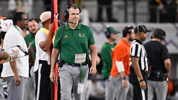 Dec 31, 2025; Arlington, TX, USA; Miami Hurricanes head coach Mario Cristobal looks on in the third quarter against the Ohio State Buckeyes during the 2025 Cotton Bowl and quarterfinal game of the College Football Playoff at AT&T Stadium. Mandatory Credit: Jerome Miron-Imagn Images