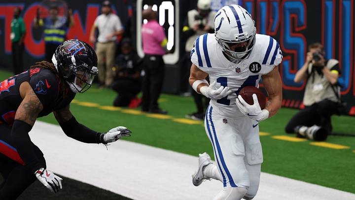Jan 4, 2026; Houston, Texas, USA;  Indianapolis Colts wide receiver Alec Pierce (14) catches a touchdown pass against the Houston Texans during the first half at NRG Stadium. Mandatory Credit: Thomas Shea-Imagn Images