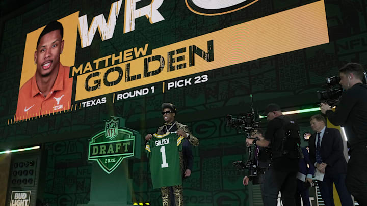 Wide receiver Matthew Golden of Texas poses after being selected in the first round by the Green Bay Packers.