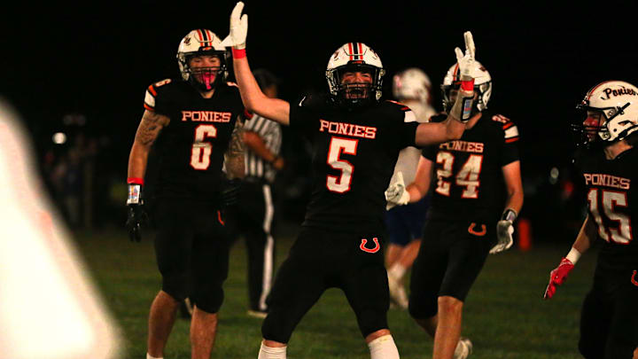 Kincaid South Fork celebrates their touchdown catch to end the first half against Pawnee during an Illinois 8-Man Football Association game on Saturday, Oct. 11, 2025.