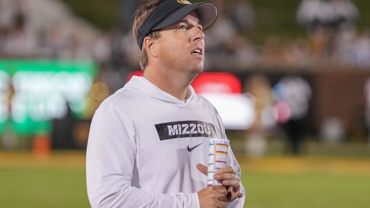 Sep 7, 2024; Columbia, Missouri, USA; Missouri Tigers head coach Eli Drinkwitz watches a replay against the Buffalo Bulls during the second half at Faurot Field at Memorial Stadium. Mandatory Credit: Denny Medley-Imagn Images