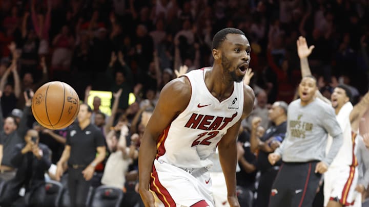 Nov 10, 2025; Miami, Florida, USA;  Miami Heat forward Andrew Wiggins (22) reacts after he dunks to win the game against the Cleveland Cavaliers during overtime at Kaseya Center. Mandatory Credit: Rhona Wise-Imagn Images