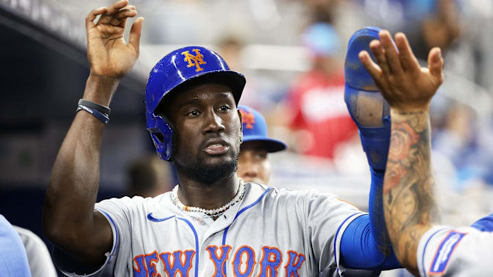 Sep 18, 2023; Miami, Florida, USA; New York Mets shortstop Ronny Mauricio (10) celebrates scoring in the dugout against the Miami Marlins during the fifth inning at loanDepot Park. Mandatory Credit: Rhona Wise-Imagn Images