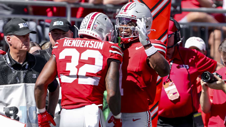 Sep 21, 2024; Columbus, Ohio, USA; Ohio State Buckeyes running back TreVeyon Henderson (32) celebrates the touchdown with running back Quinshon Judkins (1) during the second quarter against the Marshall Thundering Herd at Ohio Stadium. Sep 21, 2024; Columbus, Ohio, USA; Ohio State Buckeyes running back TreVeyon Henderson (32) celebrates the touchdown with running back Quinshon Judkins (1) during the second quarter against the Marshall Thundering Herd at Ohio Stadium.