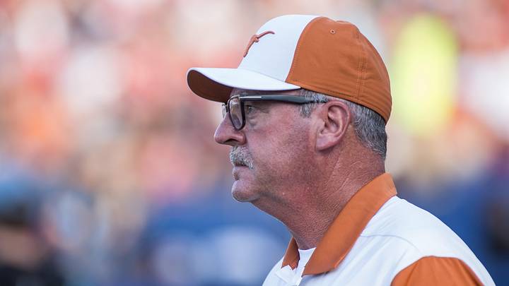 Texas Longhorns head coach Mike White looks on in the first inning against the Texas Tech Red Raiders.