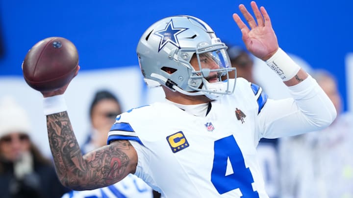 Dallas Cowboys quarterback Dak Prescott warms up before the game against the New York Giants at MetLife Stadium.