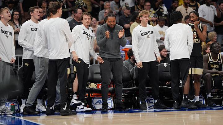 Mar 10, 2026; Charlotte, NC, USA;  Wake Forest Demon Deacons bench reacts after taking the lead in the second half against the Virginia Tech Hokies at Spectrum Center. Mandatory Credit: Jim Dedmon-Imagn Images