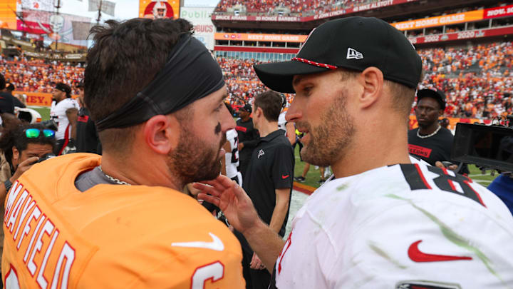 Oct 27, 2024; Tampa, Florida, USA; Tampa Bay Buccaneers quarterback Baker Mayfield (6) greets Atlanta Falcons quarterback Kirk Cousins (18) after a game at Raymond James Stadium. Mandatory Credit: Nathan Ray Seebeck-Imagn Images
