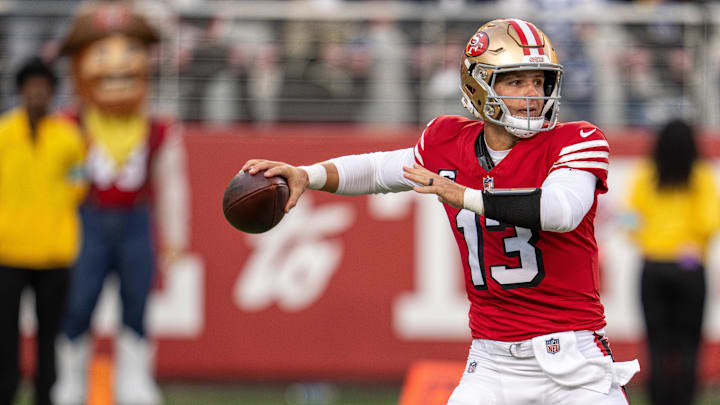Oct 27, 2024; Santa Clara, California, USA; San Francisco 49ers quarterback Brock Purdy (13) prepares to pass against the Dallas Cowboys during the first quarter at Levi's Stadium. Mandatory Credit: Neville E. Guard-Imagn Images Oct 27, 2024; Santa Clara, California, USA; San Francisco 49ers quarterback Brock Purdy (13) prepares to pass against the Dallas Cowboys during the first quarter at Levi's Stadium. Mandatory Credit: Neville E. Guard-Imagn Images