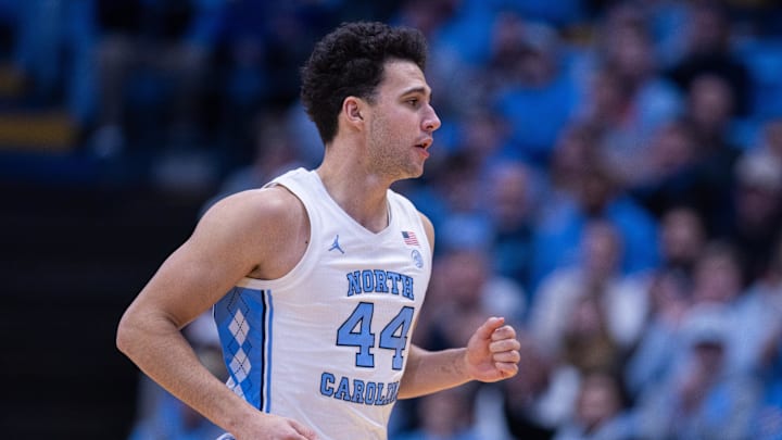 Dec 22, 2025; Chapel Hill, North Carolina, USA; North Carolina Tar Heels guard Luka Bogavac (44) runs back during the first half against the East Carolina Pirates at Dean E. Smith Center. Mandatory Credit: Scott Kinser-Imagn Images Dec 22, 2025; Chapel Hill, North Carolina, USA; North Carolina Tar Heels guard Luka Bogavac (44) runs back during the first half against the East Carolina Pirates at Dean E. Smith Center. Mandatory Credit: Scott Kinser-Imagn Images