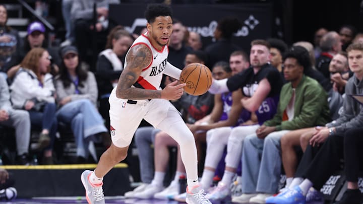 Feb 24, 2025; Salt Lake City, Utah, USA; Portland Trail Blazers guard Anfernee Simons (1) brings the ball up the court against the Utah Jazz during the second half at Delta Center. Mandatory Credit: Rob Gray-Imagn Images