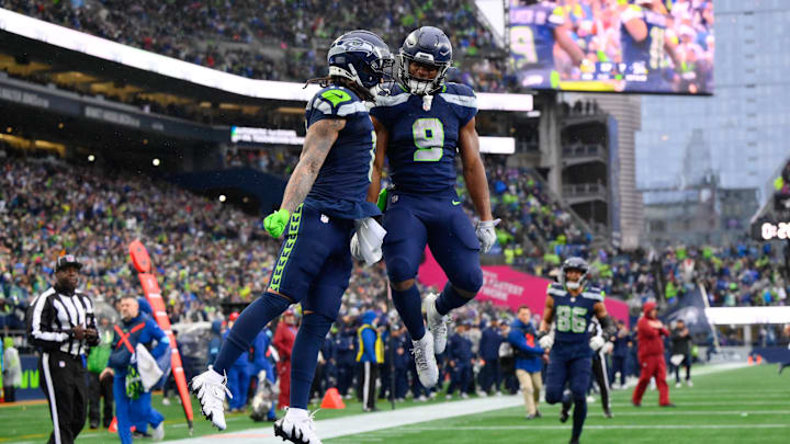 Seattle Seahawks wide receiver Jaxon Smith-Njigba (11) and running back Kenneth Walker III (9) celebrate after Jaxon Smith-Njigba scored a touchdown against the Minnesota Vikings during the first half at Lumen Field. Seattle Seahawks wide receiver Jaxon Smith-Njigba (11) and running back Kenneth Walker III (9) celebrate after Jaxon Smith-Njigba scored a touchdown against the Minnesota Vikings during the first half at Lumen Field.