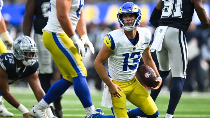 Aug 11, 2024; Inglewood, California, USA; Los Angeles Rams quarterback Stetson Bennett (13) stands up after getting sacked against the Dallas Cowboys during the fourth quarter at SoFi Stadium. Mandatory Credit: Jonathan Hui-USA TODAY Sports Aug 11, 2024; Inglewood, California, USA; Los Angeles Rams quarterback Stetson Bennett (13) stands up after getting sacked against the Dallas Cowboys during the fourth quarter at SoFi Stadium. Mandatory Credit: Jonathan Hui-USA TODAY Sports
