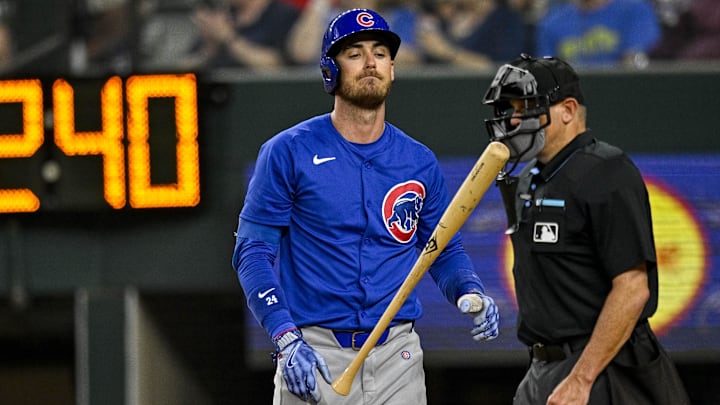 Mar 28, 2024; Arlington, Texas, USA; Chicago Cubs center fielder Cody Bellinger (24) strikes out during the game between the Texas Rangers and the Chicago Cubs at Globe Life Field. Mandatory Credit: Jerome Miron-Imagn Images