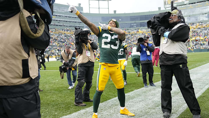 Oct 13, 2024; Green Bay, Wisconsin, USA;  Green Bay Packers cornerback Jaire Alexander (23) celebrates following the game against the Arizona Cardinals at Lambeau Field. Mandatory Credit: Jeff Hanisch-Imagn Images