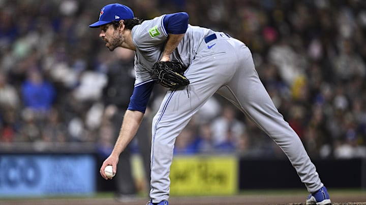 Apr 20, 2024; San Diego, California, USA; Toronto Blue Jays relief pitcher Jordan Romano (68) prepares to pitch against the San Diego Padres during the ninth inning at Petco Park. Mandatory Credit: Orlando Ramirez-Imagn Images