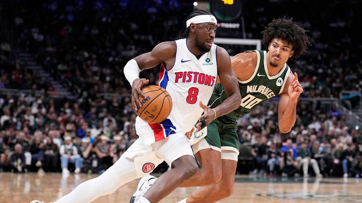 Nov 22, 2025; Milwaukee, Wisconsin, USA; Detroit Pistons guard Caris Levert (8) drives against Milwaukee Bucks center Jericho Sims (00) in the second half at Fiserv Forum. Mandatory Credit: Michael McLoone-Imagn Images Nov 22, 2025; Milwaukee, Wisconsin, USA; Detroit Pistons guard Caris Levert (8) drives against Milwaukee Bucks center Jericho Sims (00) in the second half at Fiserv Forum. Mandatory Credit: Michael McLoone-Imagn Images