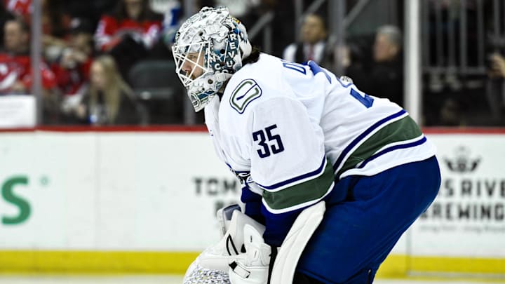Mar 24, 2025; Newark, New Jersey, USA; Vancouver Canucks goaltender Thatcher Demko (35) tends net during the second period against the New Jersey Devils at Prudential Center. Mandatory Credit: John Jones-Imagn Images