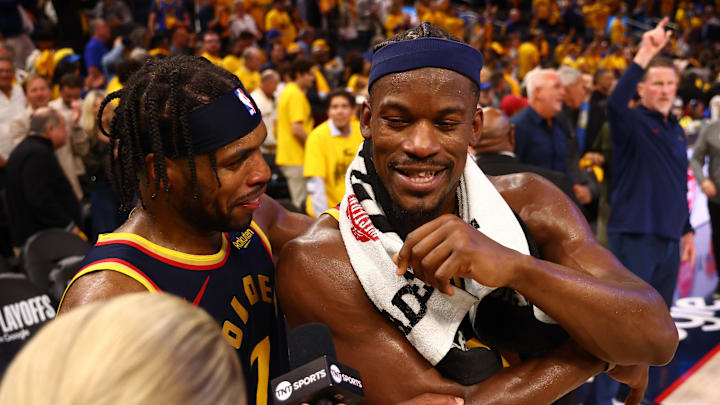  Golden State Warriors guard Buddy Hield (7) celebrates with forward Jimmy Butler III (10) as he speaks to TNT after the game four of the 2025 NBA Playoffs first round against the Houston Rockets at Chase Center. 