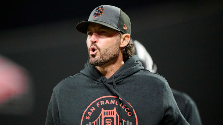 May 9, 2026; San Francisco, California, USA; San Francisco Giants manager Tony Vitello (23) reacts after infielder Christian Koss (50) was hit in the head with a pitch thrown by pitcher Cam Sanders (not pictured) during the ninth inning at Oracle Park. Mandatory Credit: Robert Edwards-Imagn Images