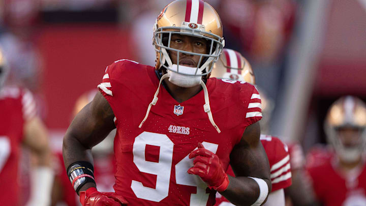 Aug 25, 2023; Santa Clara, California, USA;  San Francisco 49ers defensive end Clelin Ferrell (94) runs out of the tunnel before the start of the first quarter against the Los Angeles Chargers at Levi's Stadium. Mandatory Credit: Stan Szeto-Imagn Images