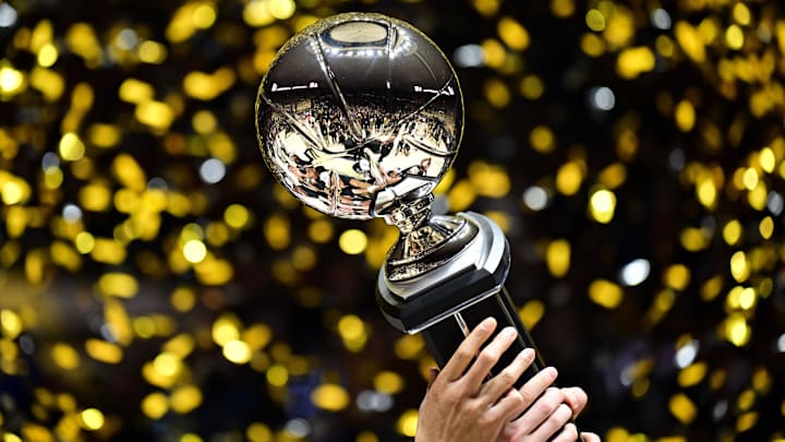 The Purdue Boilermakers hold up the Big Ten Champions trophy The Purdue Boilermakers hold up the Big Ten Champions trophy