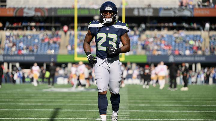 Oct 11, 2026; Seattle, Washington, USA; Seattle Seahawks running back Emanuel Wilson (23) warms up before a game against the San Francisco 49ers at Lumen Field. Oct 11, 2026; Seattle, Washington, USA; Seattle Seahawks running back Emanuel Wilson (23) warms up before a game against the San Francisco 49ers at Lumen Field.