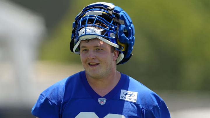 Jun 3, 2022; Thousand Oaks, CA, USA; Los Angeles Rams guard Logan Bruss (60) during organized team activities at California Lutheran University. Mandatory Credit: Kirby Lee-Imagn Images Jun 3, 2022; Thousand Oaks, CA, USA; Los Angeles Rams guard Logan Bruss (60) during organized team activities at California Lutheran University. Mandatory Credit: Kirby Lee-Imagn Images
