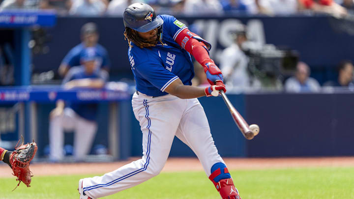 Aug 13, 2023; Toronto, Ontario, CAN; Toronto Blue Jays first baseman Vladimir Guerrero Jr. (27) bats against the Chicago Cubs during the fifth inning at Rogers Centre.